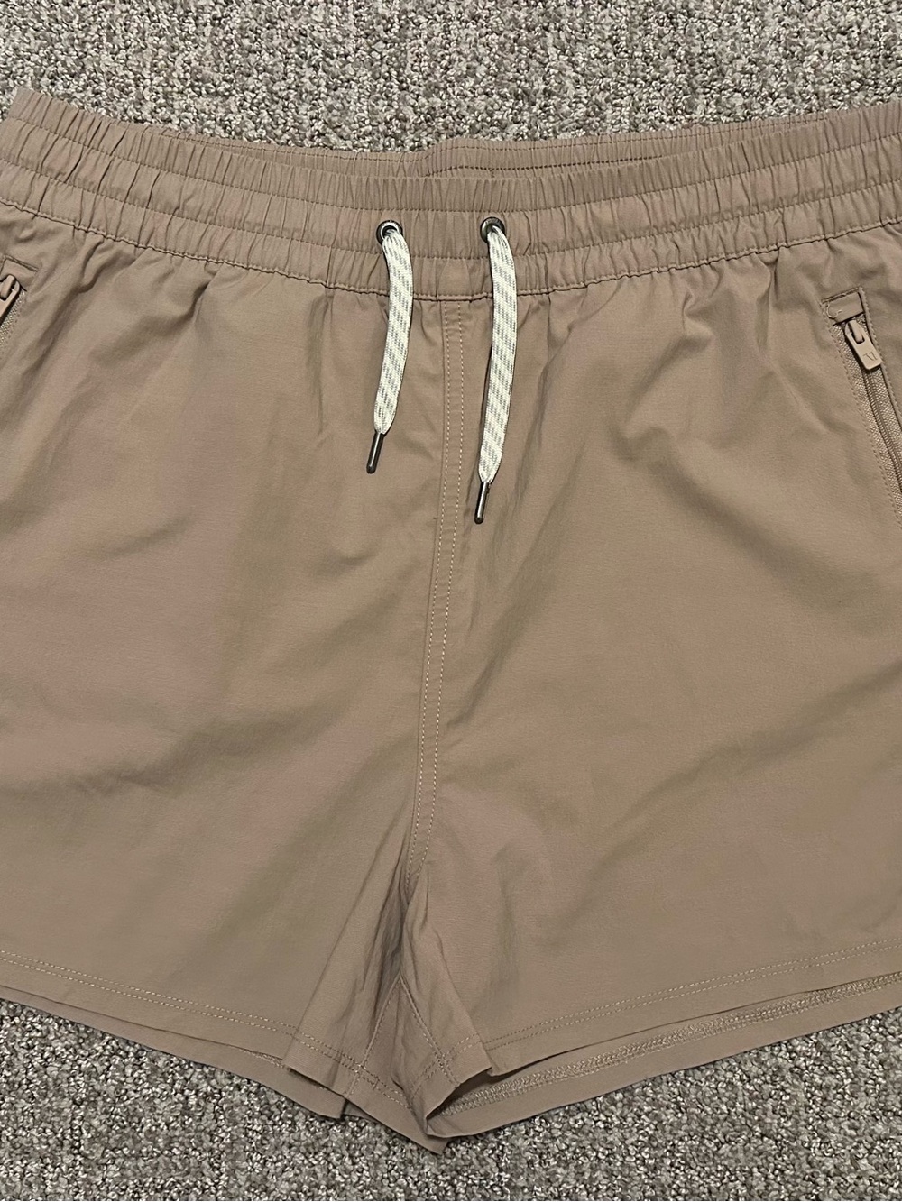 Vuori Women’s Athletic Drawstring Shorts in Taupe with White Drawcord